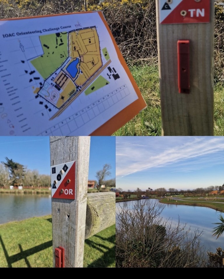 Outdoor orienteering course with a map and scenic landscape views.